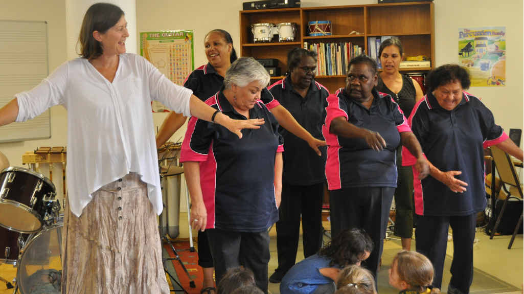 The Awakening Voices of Harmony performing with school music teacher Bernadine Bradshaw.